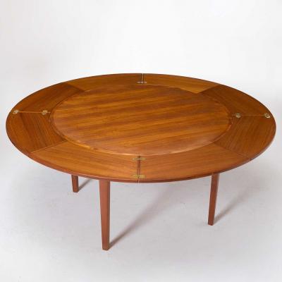  Dyrlund Danish Teak Circular Expanding Flip Flap Dining Table by Dyrlund Furniture