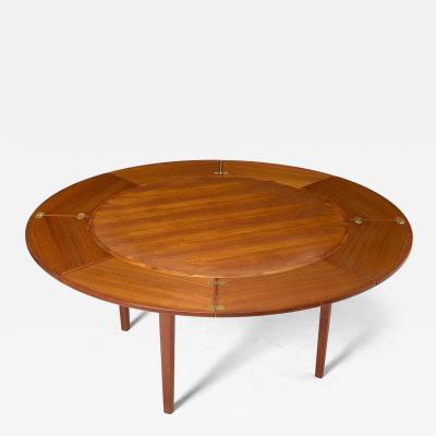  Dyrlund Danish Teak Circular Expanding Flip Flap Dining Table by Dyrlund Furniture
