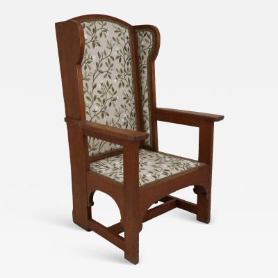  E G Punnett E G Punnet attributed Probably made by William Birch An oak wing back armchair