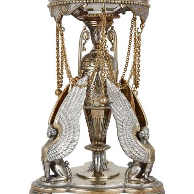  Elkington Co A parcel gilt and electroplated epergnes suite by Elkington Co 