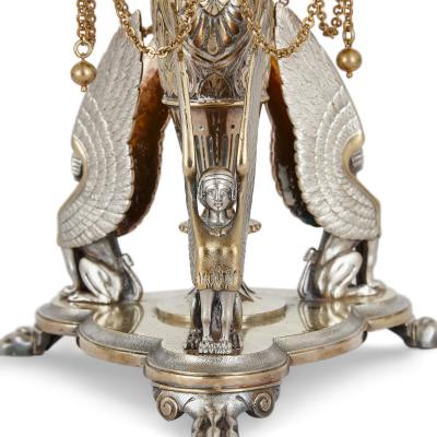  Elkington Co A parcel gilt and electroplated epergnes suite by Elkington Co 