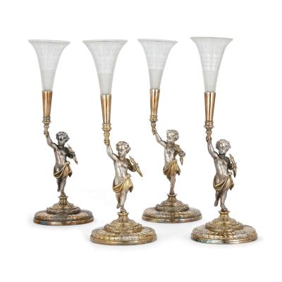  Elkington Co A parcel gilt and electroplated epergnes suite by Elkington Co 