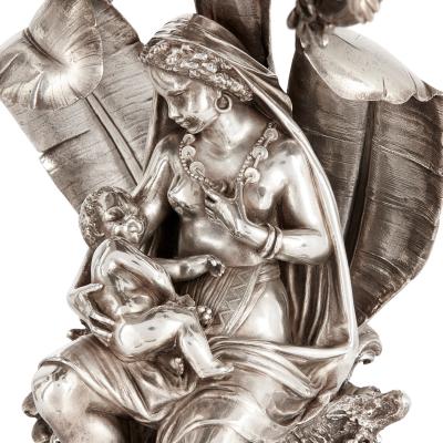  Elkington Co Pair of figural candelabra by Elkington Mason Co