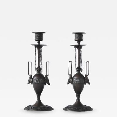  F L Vombach Offenbach A M A pair of candleholders by F L Vombach Germany circa late 19th century