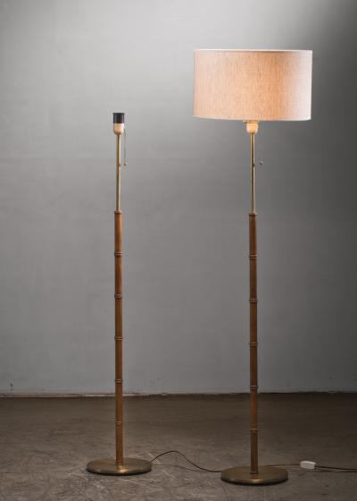  Falkenbergs Belysning Pair of oak and brass floor lamps