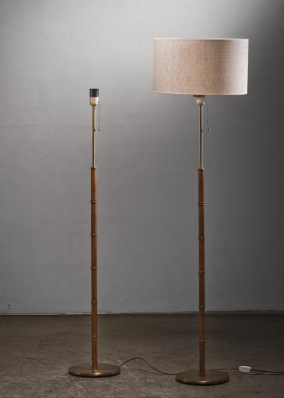  Falkenbergs Belysning Pair of oak and brass floor lamps