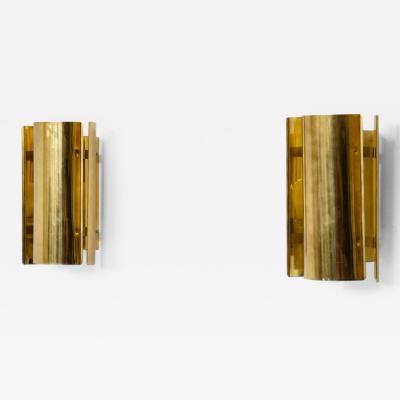  Falkenbergs Belysning Pair of sconce wall lights in curved brass