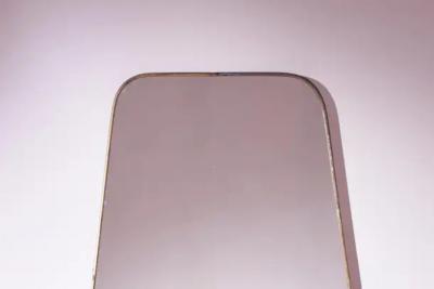  Fontana Arte FontanaArte A substantial midcentury modernist wall mirror with brass frame Italy 1950s