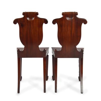  George Seddon Sons A pair of rare Regency mahogany hall chairs from the Bateson family