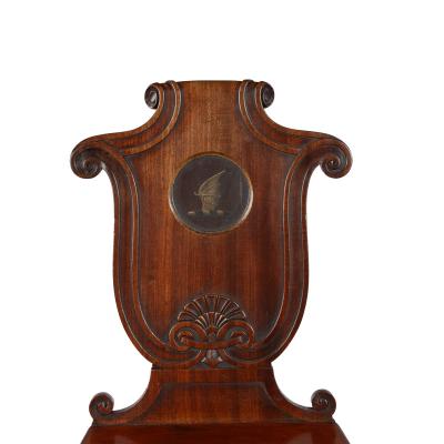  George Seddon Sons A pair of rare Regency mahogany hall chairs from the Bateson family