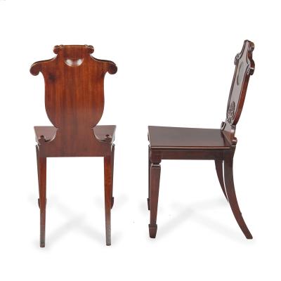  George Seddon Sons A pair of rare Regency mahogany hall chairs from the Bateson family
