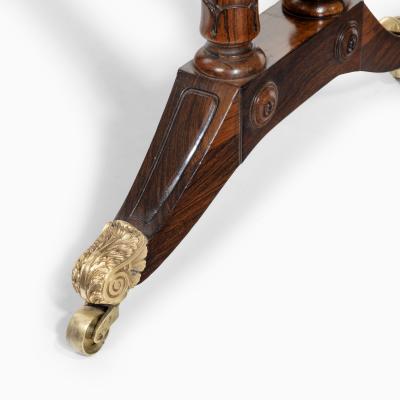  Gillows of Lancaster London A William IV rosewood free standing end support table attributed to Gillows