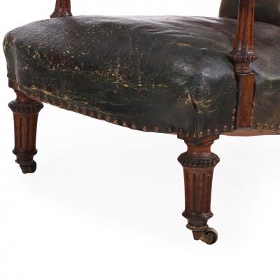  Gillows of Lancaster London An English Walnut and Tufted Leather Library Armchair by Gillows 19th C 