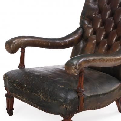  Gillows of Lancaster London An English Walnut and Tufted Leather Library Armchair by Gillows 19th C 