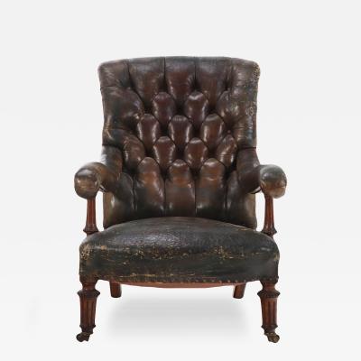  Gillows of Lancaster London An English Walnut and Tufted Leather Library Armchair by Gillows 19th C 