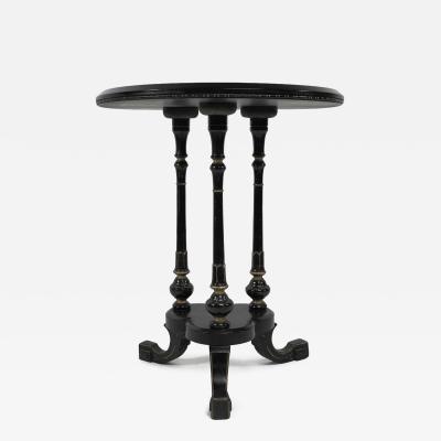  Gillows of Lancaster London Gillows of Lancaster An Aesthetic Movement ebonized circular side table