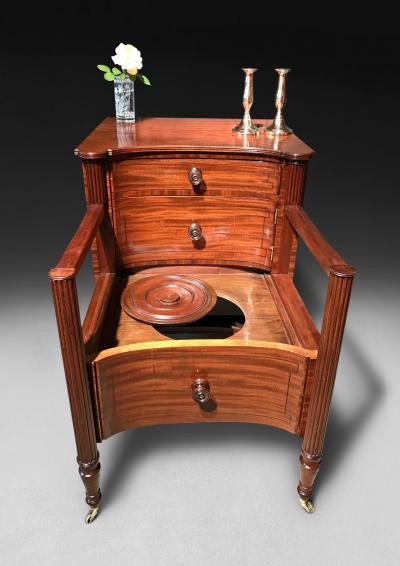  Gillows of Lancaster London Regency Period Mahogany and ebony line inlaid concave fronted commode