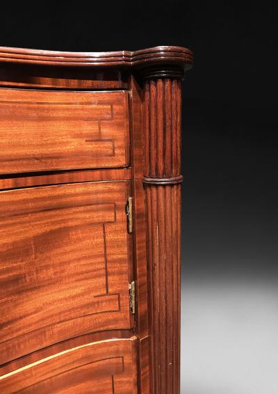 Gillows of Lancaster London Regency Period Mahogany and ebony line inlaid concave fronted commode