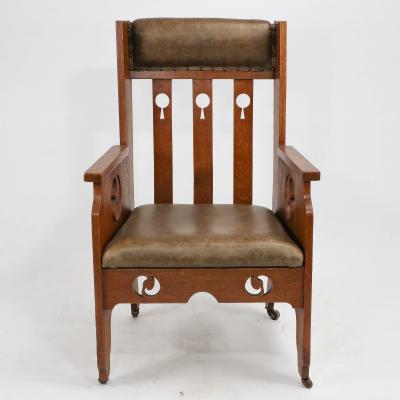  Goodyers of Regent Goodyers of Regent St An Arts Crafts Oak Armchair with Stylized Decoration