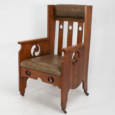  Goodyers of Regent Goodyers of Regent St An Arts Crafts Oak Armchair with Stylized Decoration