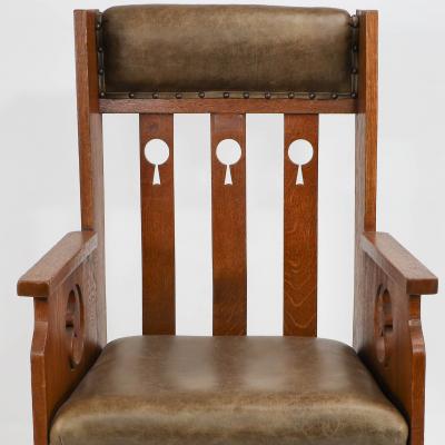  Goodyers of Regent Goodyers of Regent St An Arts Crafts Oak Armchair with Stylized Decoration