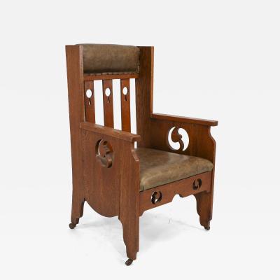  Goodyers of Regent Goodyers of Regent St An Arts Crafts Oak Armchair with Stylized Decoration
