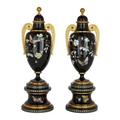  Gr flich Schaffgotsch sche Josephinenh tte A three piece Bohemian enamelled black glass vase garniture set