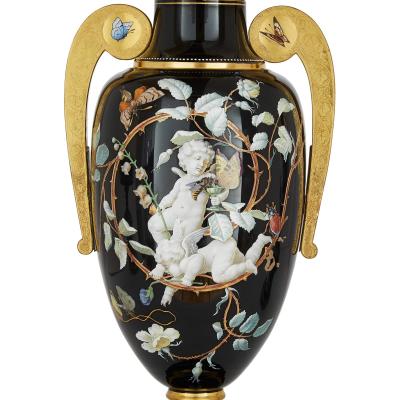  Gr flich Schaffgotsch sche Josephinenh tte A three piece Bohemian enamelled black glass vase garniture set