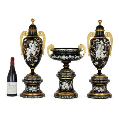  Gr flich Schaffgotsch sche Josephinenh tte A three piece Bohemian enamelled black glass vase garniture set
