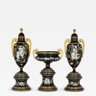  Gr flich Schaffgotsch sche Josephinenh tte A three piece Bohemian enamelled black glass vase garniture set