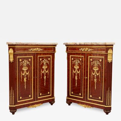  Groh Pair of antique ormolu mounted and mahogany corner cabinets by Groh Fr res