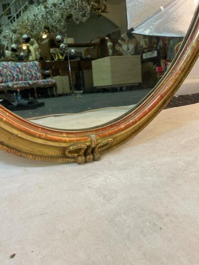 Grosfeld House EXCEPTIONAL CARVED GOLD LEAF ROPE AND TASSEL OVAL MIRROR
