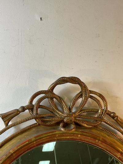  Grosfeld House EXCEPTIONAL CARVED GOLD LEAF ROPE AND TASSEL OVAL MIRROR