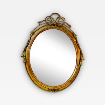  Grosfeld House EXCEPTIONAL CARVED GOLD LEAF ROPE AND TASSEL OVAL MIRROR