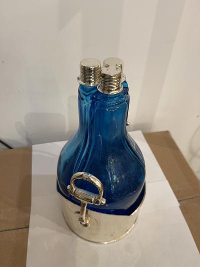  Gucci Set of three bottles in a silver plated fixture by Gucci