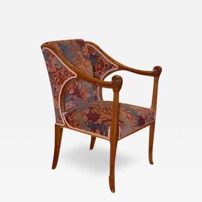  HENRI RAPIN Henri Rapin single armchair with sculpted arms