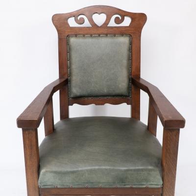  Heal s Heals Heal Son Ltd Heal Son attributed An Arts Crafts Six legged Oak Armchair