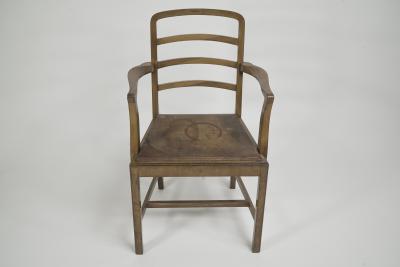 Heal s Heals Heal Son Ltd Heals attr A walnut desk chair or armchair with a rounded top and ladder back