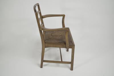 Heal s Heals Heal Son Ltd Heals attr A walnut desk chair or armchair with a rounded top and ladder back