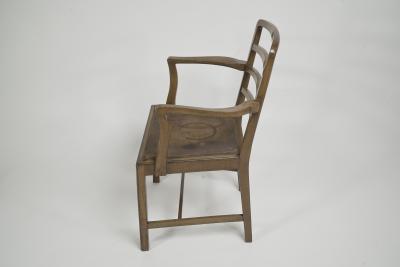 Heal s Heals Heal Son Ltd Heals attr A walnut desk chair or armchair with a rounded top and ladder back