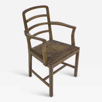  Heal s Heals Heal Son Ltd Heals attr A walnut desk chair or armchair with a rounded top and ladder back 