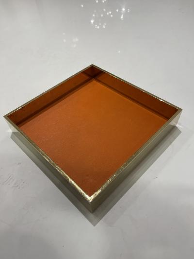  Herm s 1980s Gilt metal and orange leather vide poche by Herm s