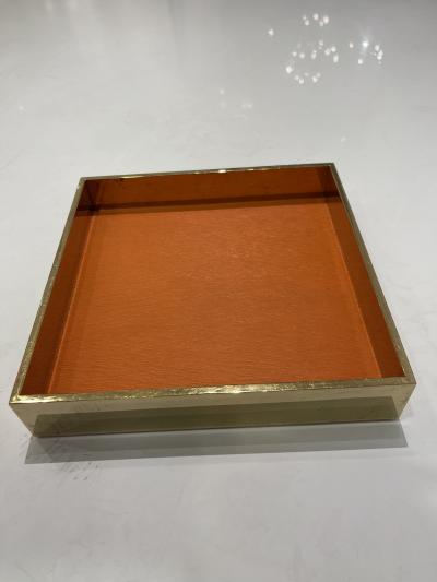  Herm s 1980s Gilt metal and orange leather vide poche by Herm s