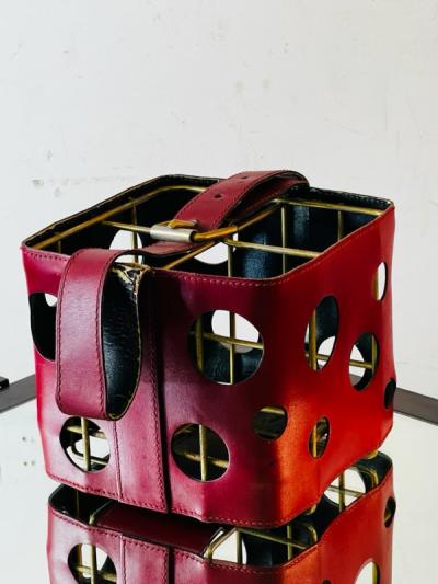  Herm s MODERNIST FRENCH RED PLEATHER AND BRASS WINE HOLDER IN THE STYLE OF HERMES