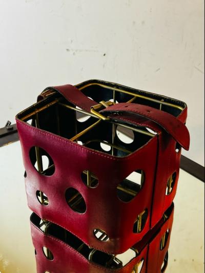  Herm s MODERNIST FRENCH RED PLEATHER AND BRASS WINE HOLDER IN THE STYLE OF HERMES