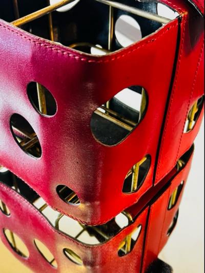  Herm s MODERNIST FRENCH RED PLEATHER AND BRASS WINE HOLDER IN THE STYLE OF HERMES