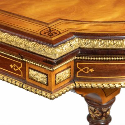  Holland Sons A Victorian fine satinwood ladies writing table attributed to Holland and Sons