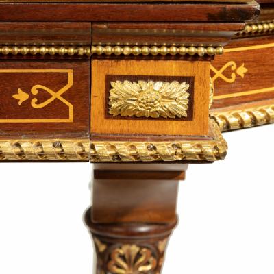  Holland Sons A Victorian fine satinwood ladies writing table attributed to Holland and Sons