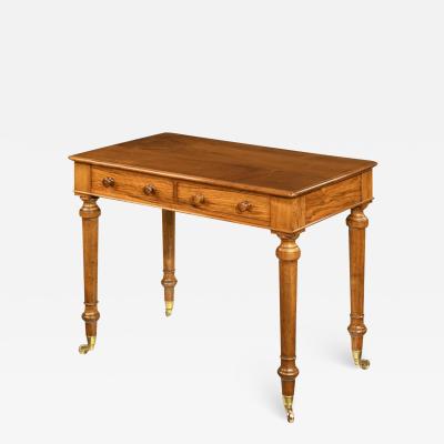  Holland Sons A mid Victorian free standing walnut writing table by Holland and Sons