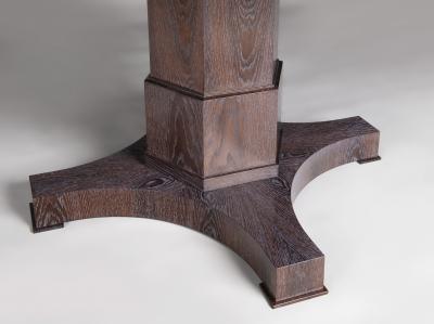  ILIAD DESIGN A pedestal dining table by ILIAD Design